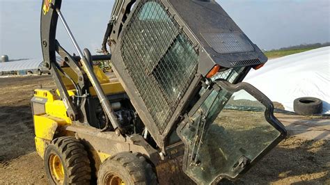 how to lift up the cab on a skid steer|new holland skid steer cab tilting.